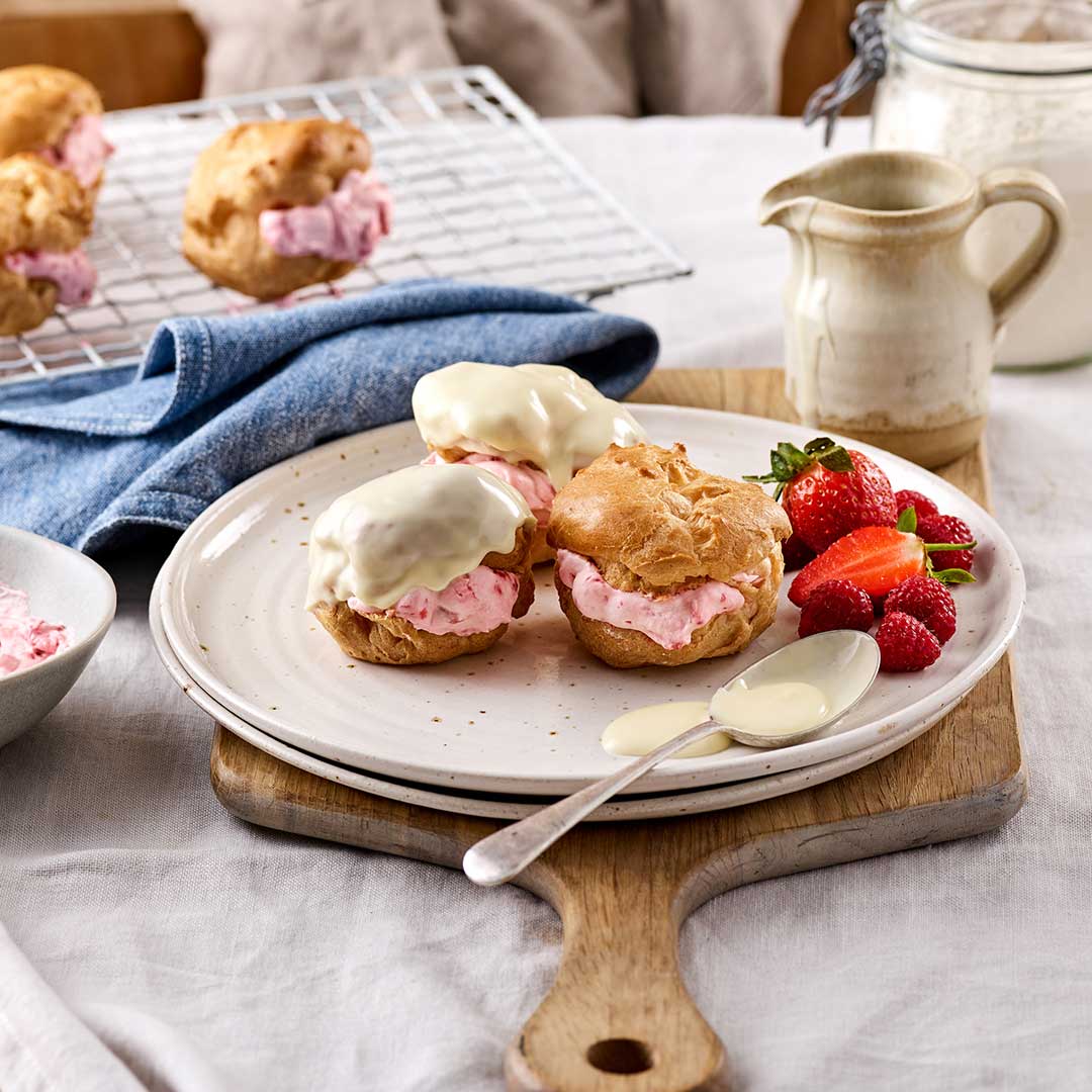 Spelt Strawberry And Raspberry Profiteroles With White Chocolate Sauce